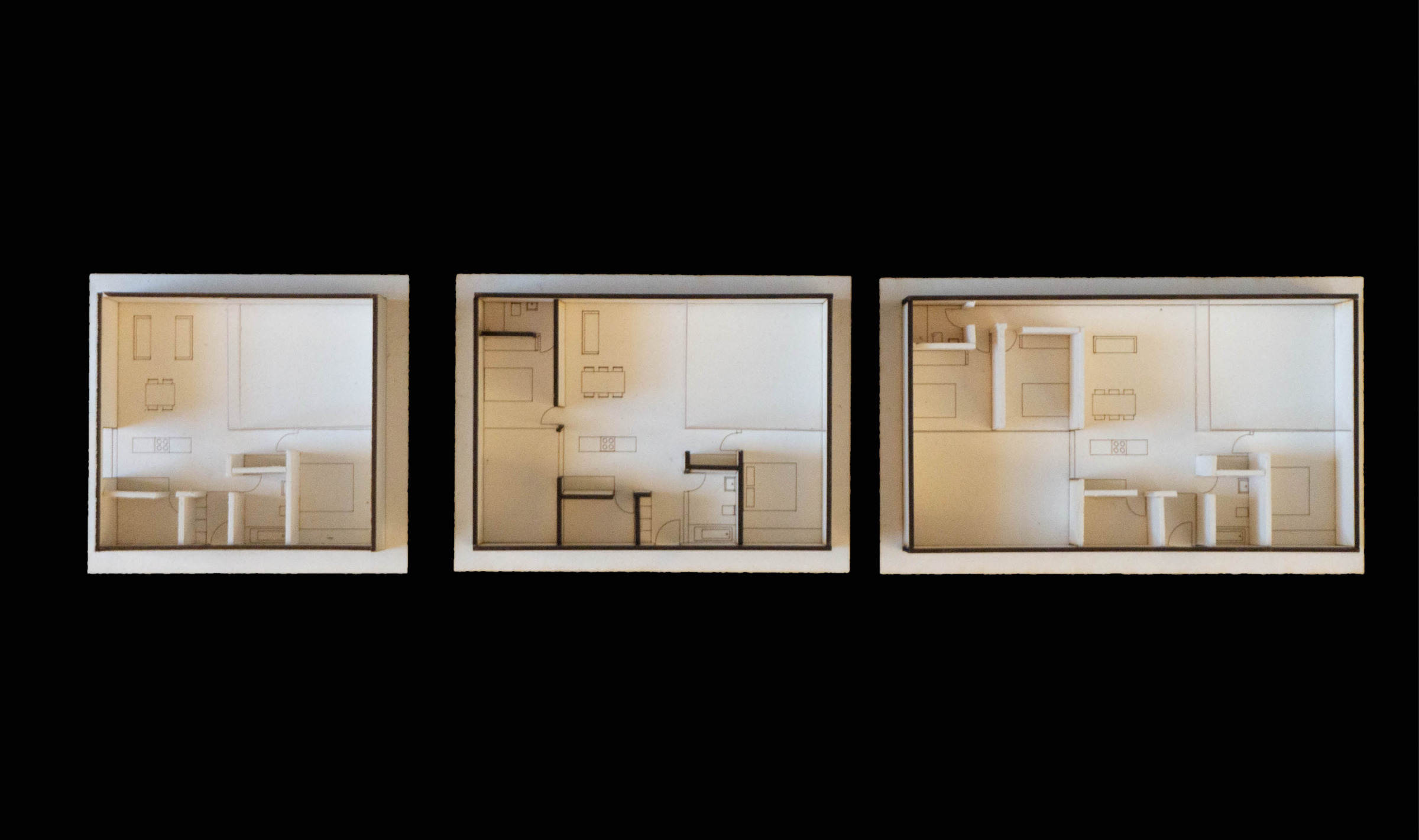 Series of physical model photographs showing interior and courtyard atmospheres.