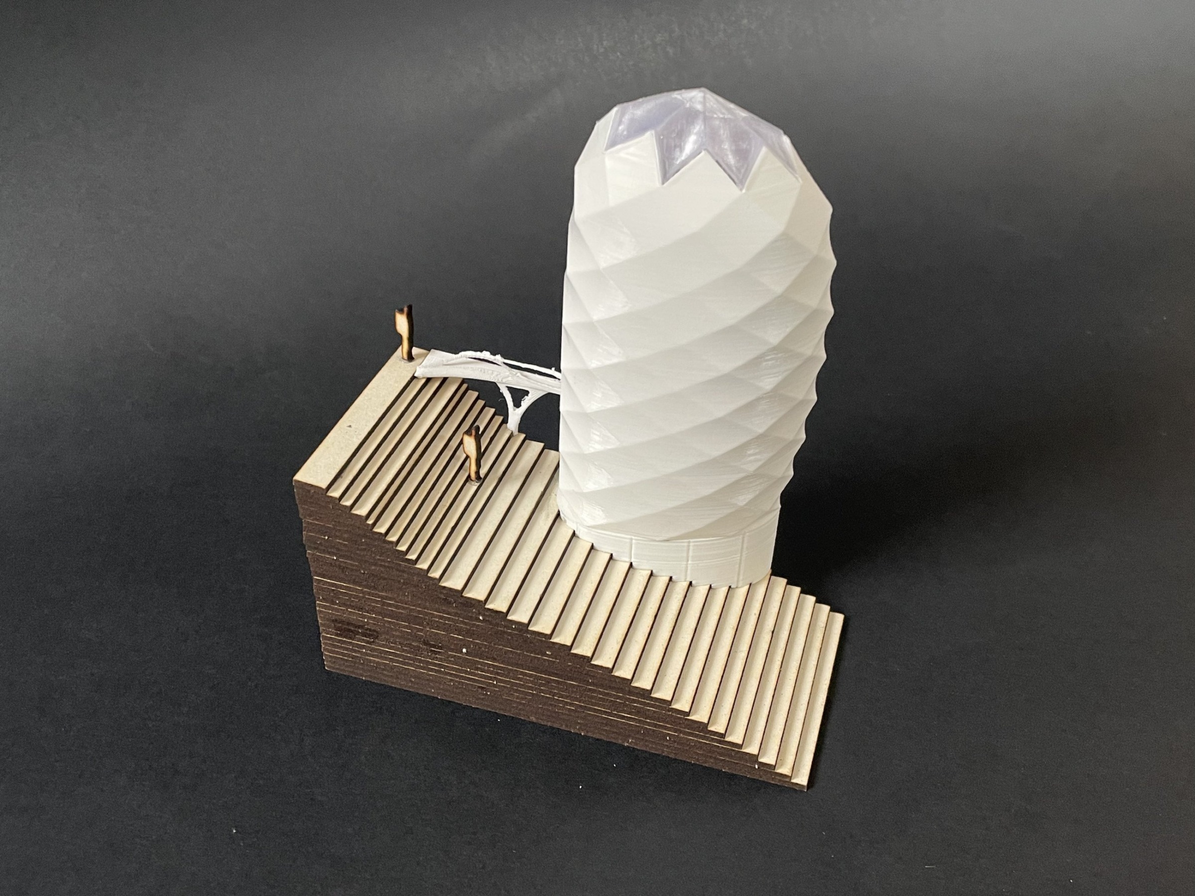 Physical model site view of the Light Tower and access bridge on the terrain base.